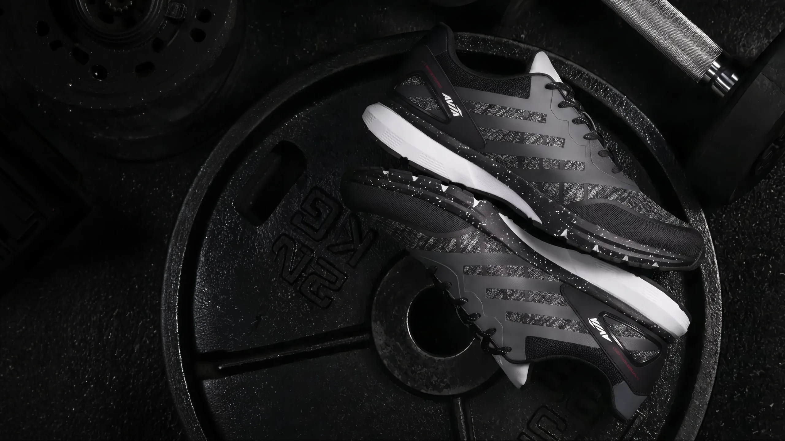 AVIA Blaster training shoes resting on a weight plate